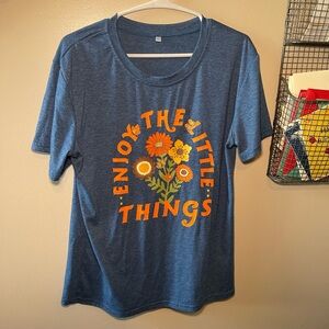 Amazon Blue Short Sleeve Tee with Orange Floral Slogan